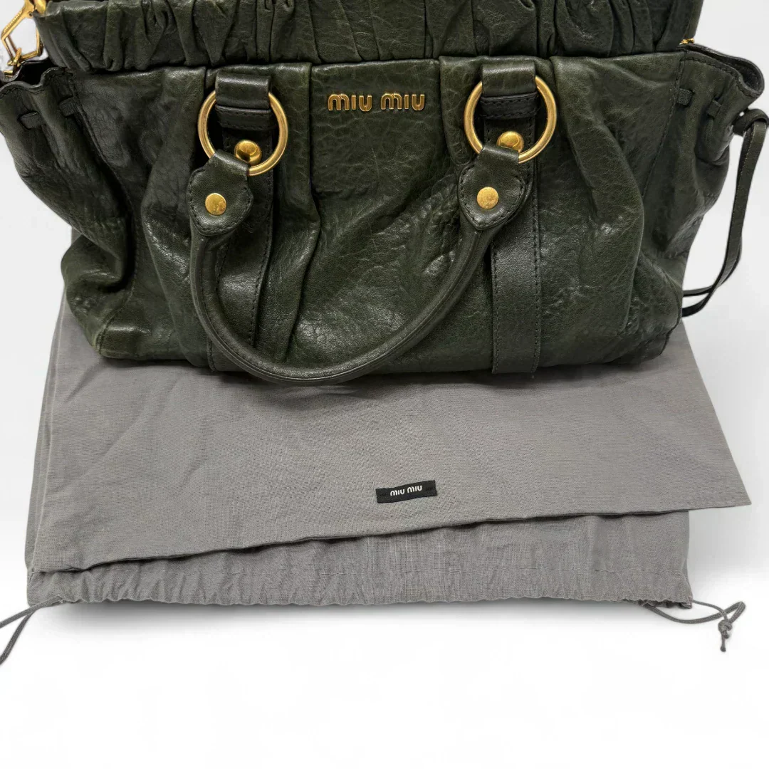 💎 Pre-owned Miu Miu Vitello Lux handbag with shoulder strap in dark green leather 💎