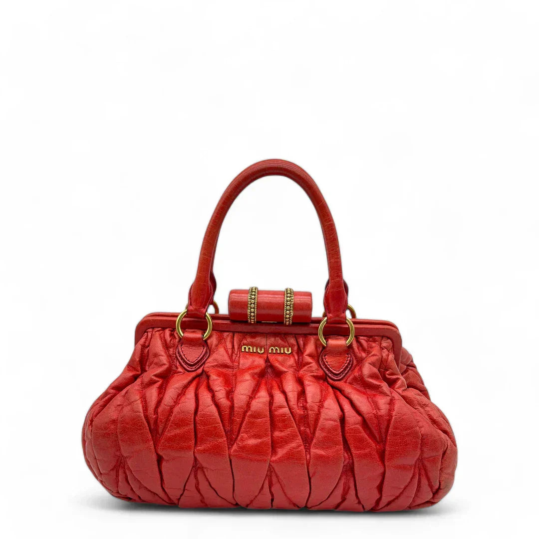 Miu Miu handbag made of leather matelasse dark red