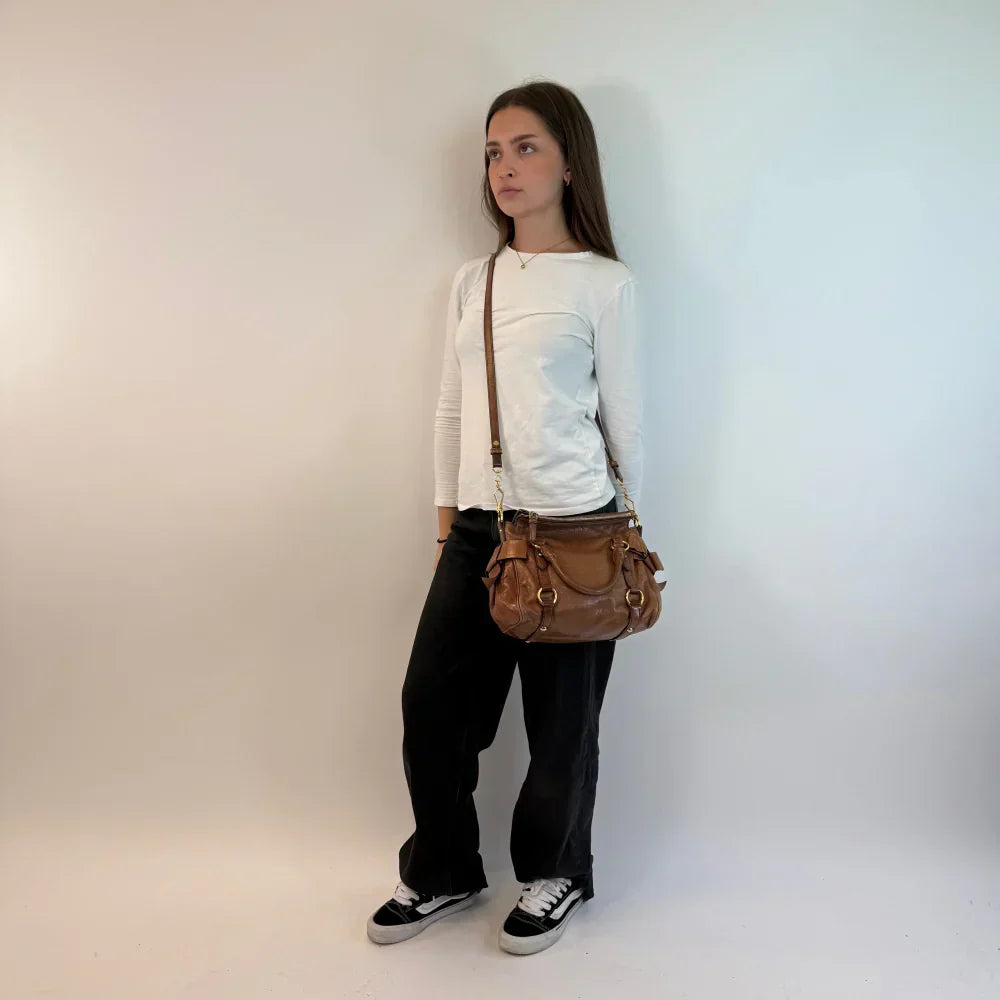 Miu Miu handbag Vitello Satchel small with shoulder strap made of brown leather