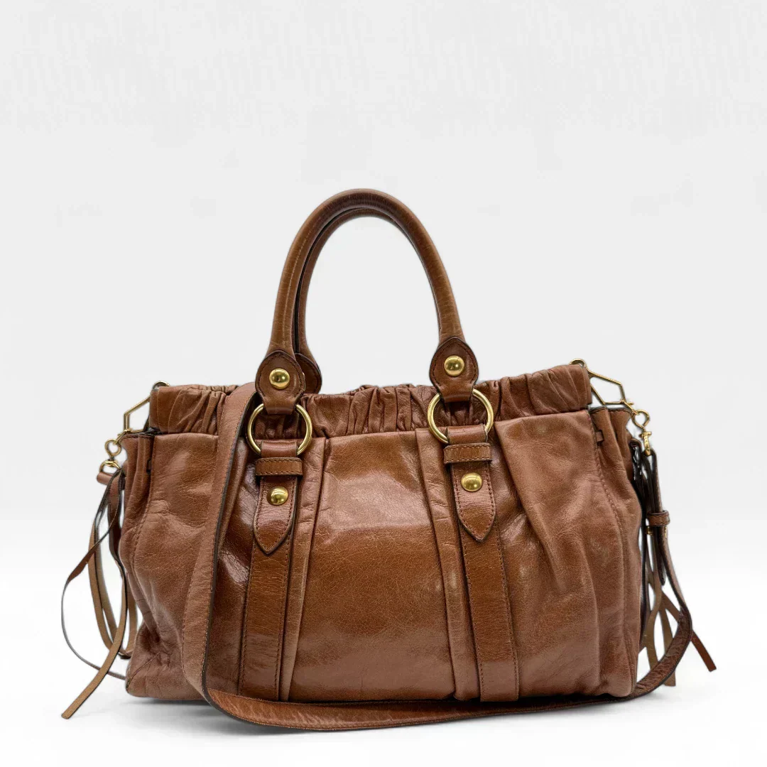 💎 Pre-owned Miu Miu handbag Vitello Lux with shoulder strap made of dark brown leather 💎