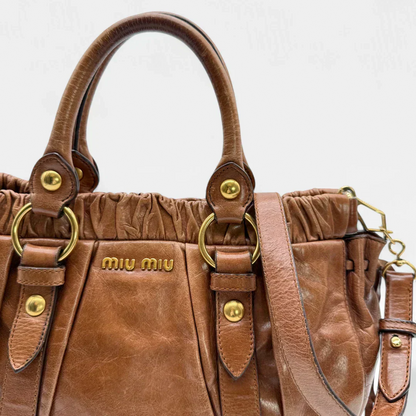 💎 Pre-owned Miu Miu handbag Vitello Lux with shoulder strap made of dark brown leather 💎