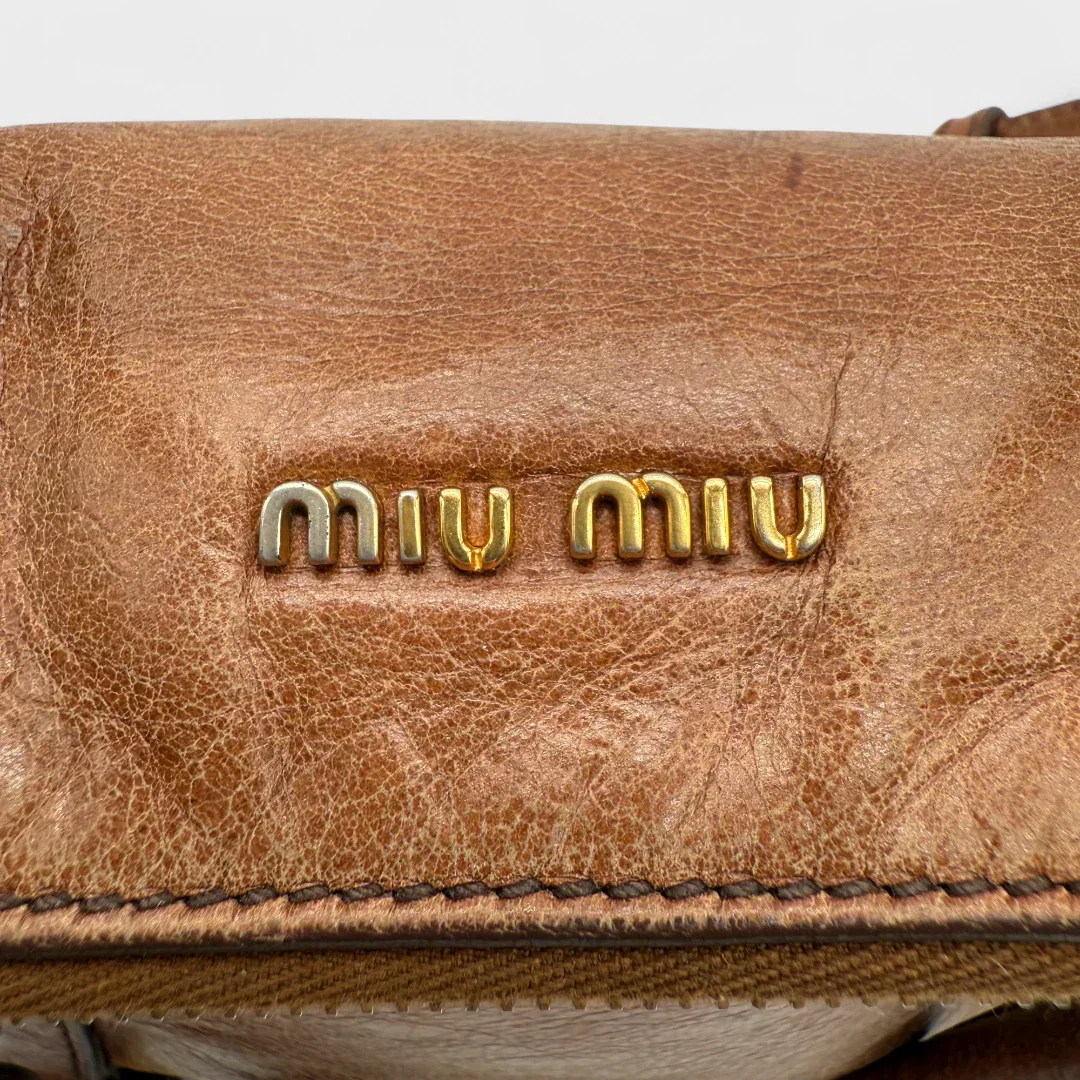 Miu Miu handbag Vitello Satchel small with shoulder strap made of brown leather