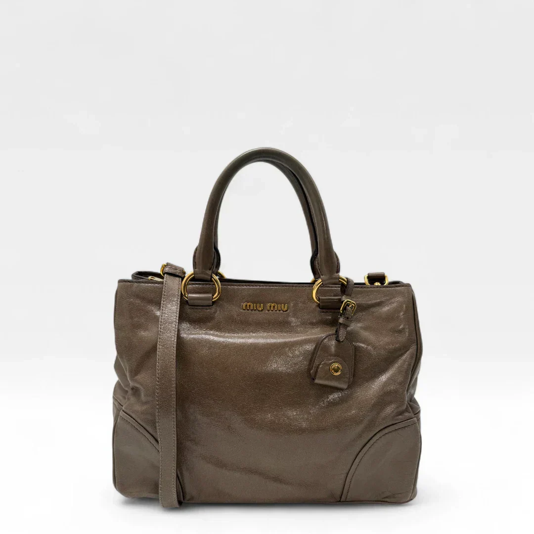 Miu Miu Vitello Shine handbag with shoulder strap in grey leather