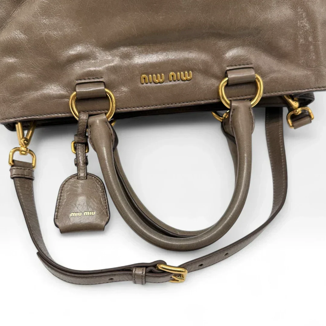 Miu Miu Vitello Shine handbag with shoulder strap in grey leather