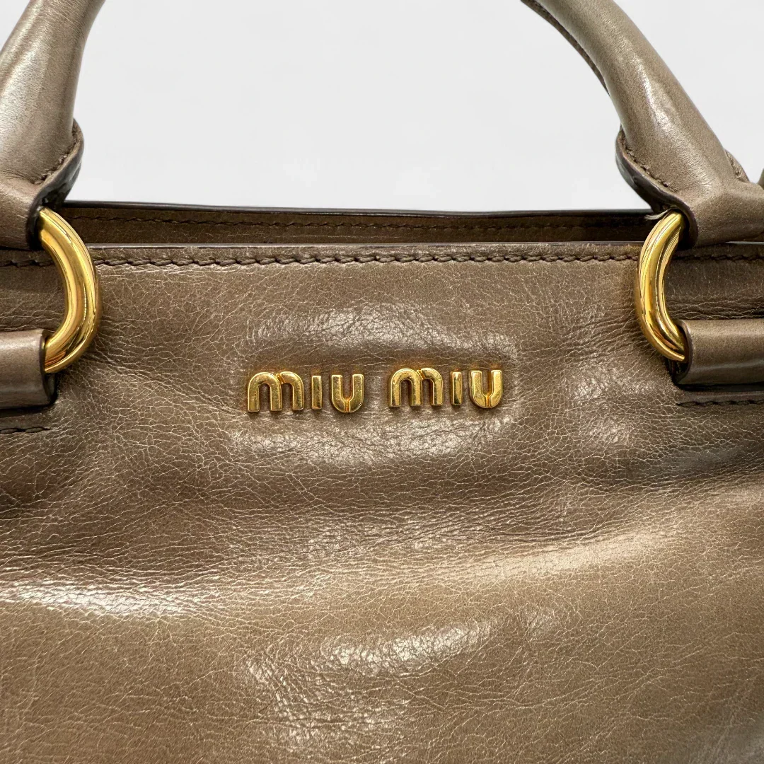 Miu Miu Vitello Shine handbag with shoulder strap in grey leather