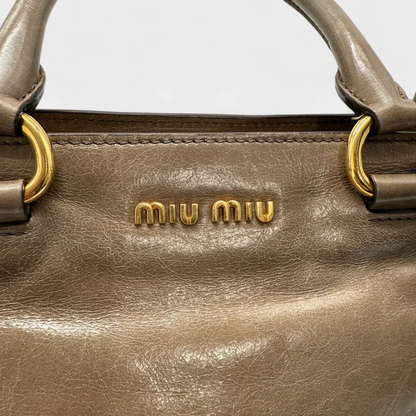 Miu Miu Vitello Shine handbag with shoulder strap in grey leather