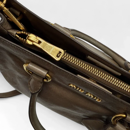 Miu Miu Vitello Shine handbag with shoulder strap in grey leather