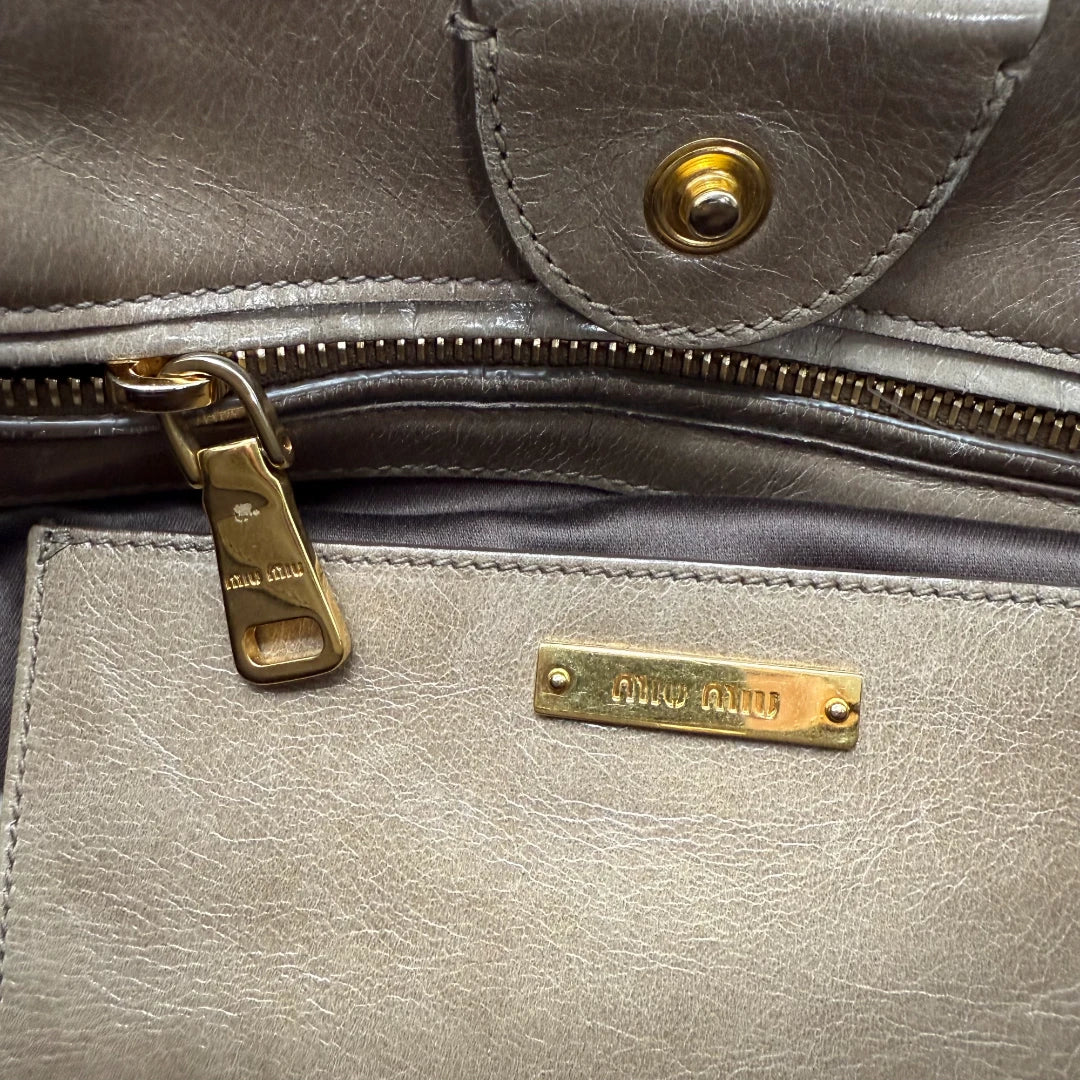 Miu Miu Vitello Shine handbag with shoulder strap in grey leather