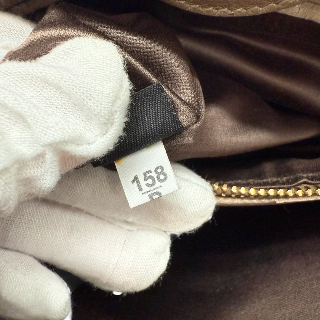 Miu Miu Vitello Shine handbag with shoulder strap in grey leather