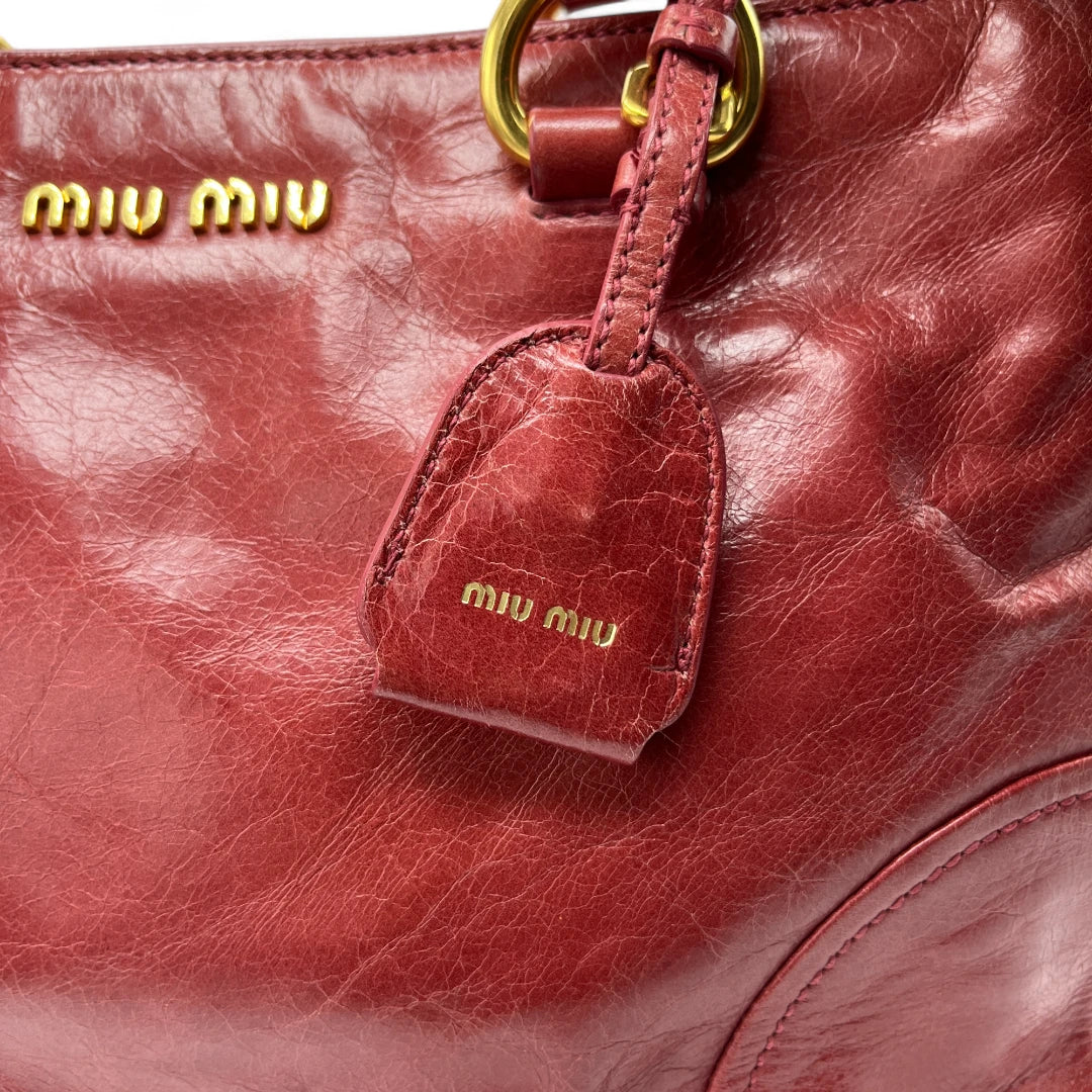 Miu Miu handbag Vitello Shine with shoulder strap made of red leather