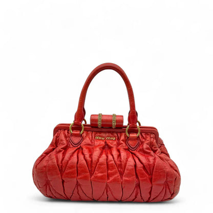 Miu Miu handbag made of leather matelasse dark red