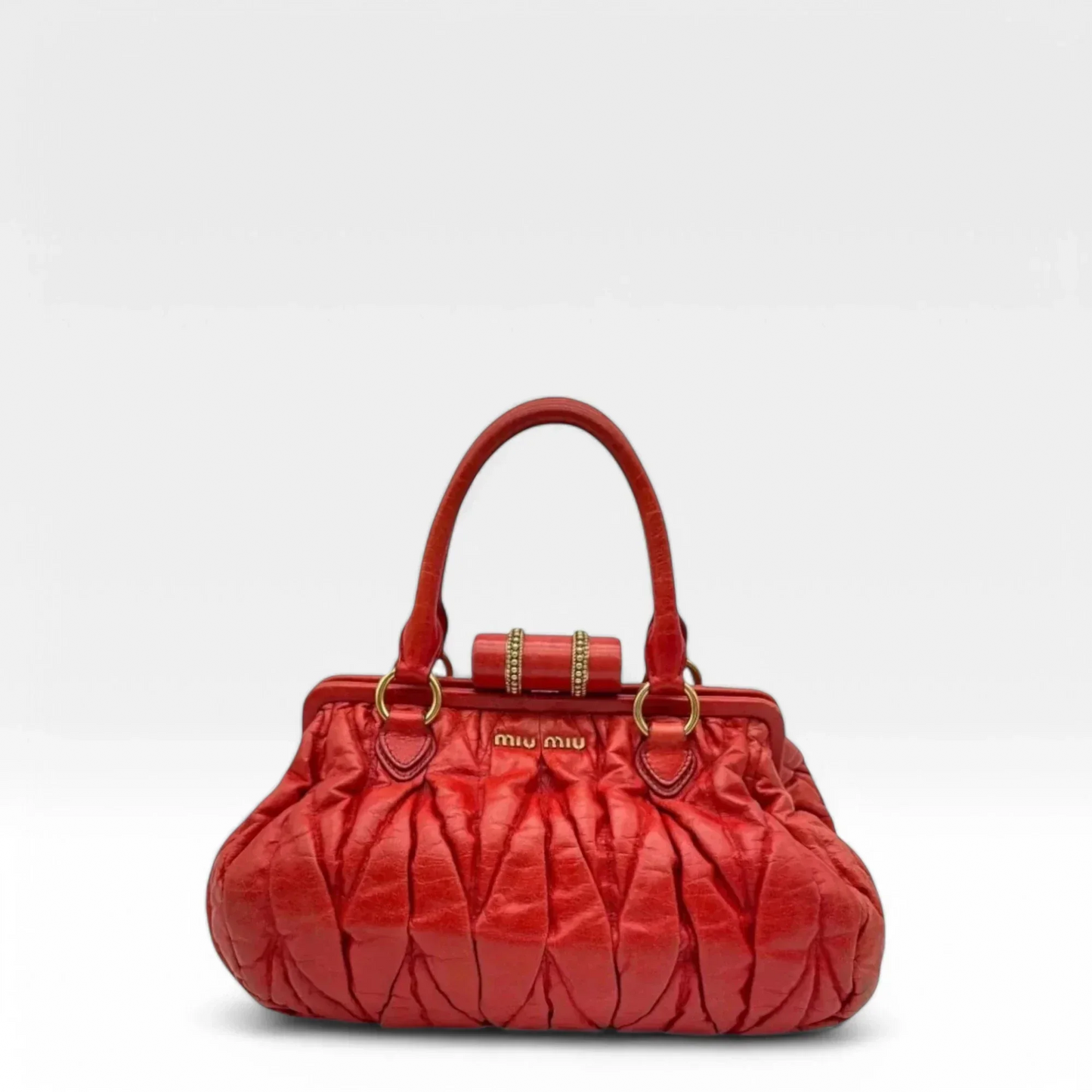 Miu Miu handbag made of leather matelasse dark red