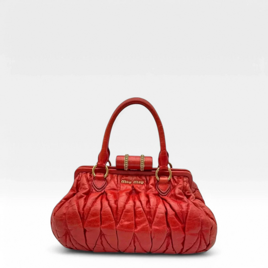 Miu Miu handbag made of leather matelasse dark red