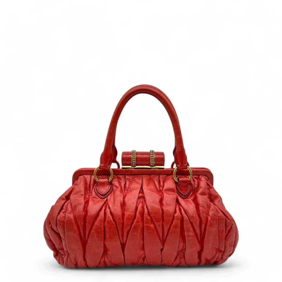 Miu Miu handbag made of leather matelasse dark red