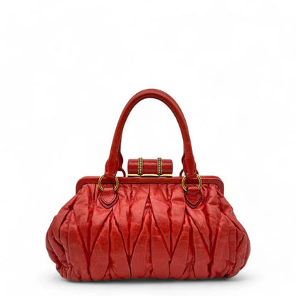Miu Miu handbag made of leather matelasse dark red
