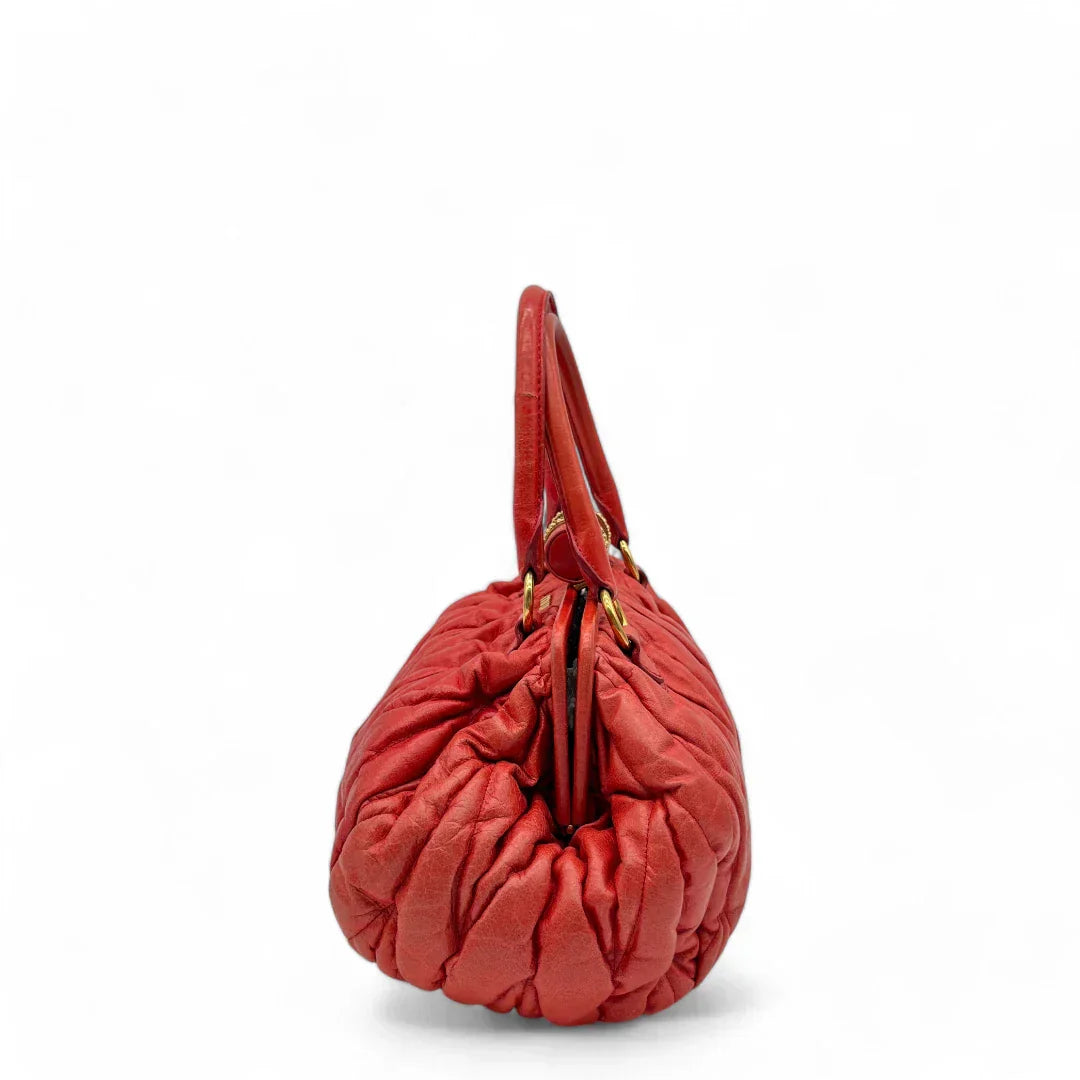 Miu Miu handbag made of leather matelasse dark red