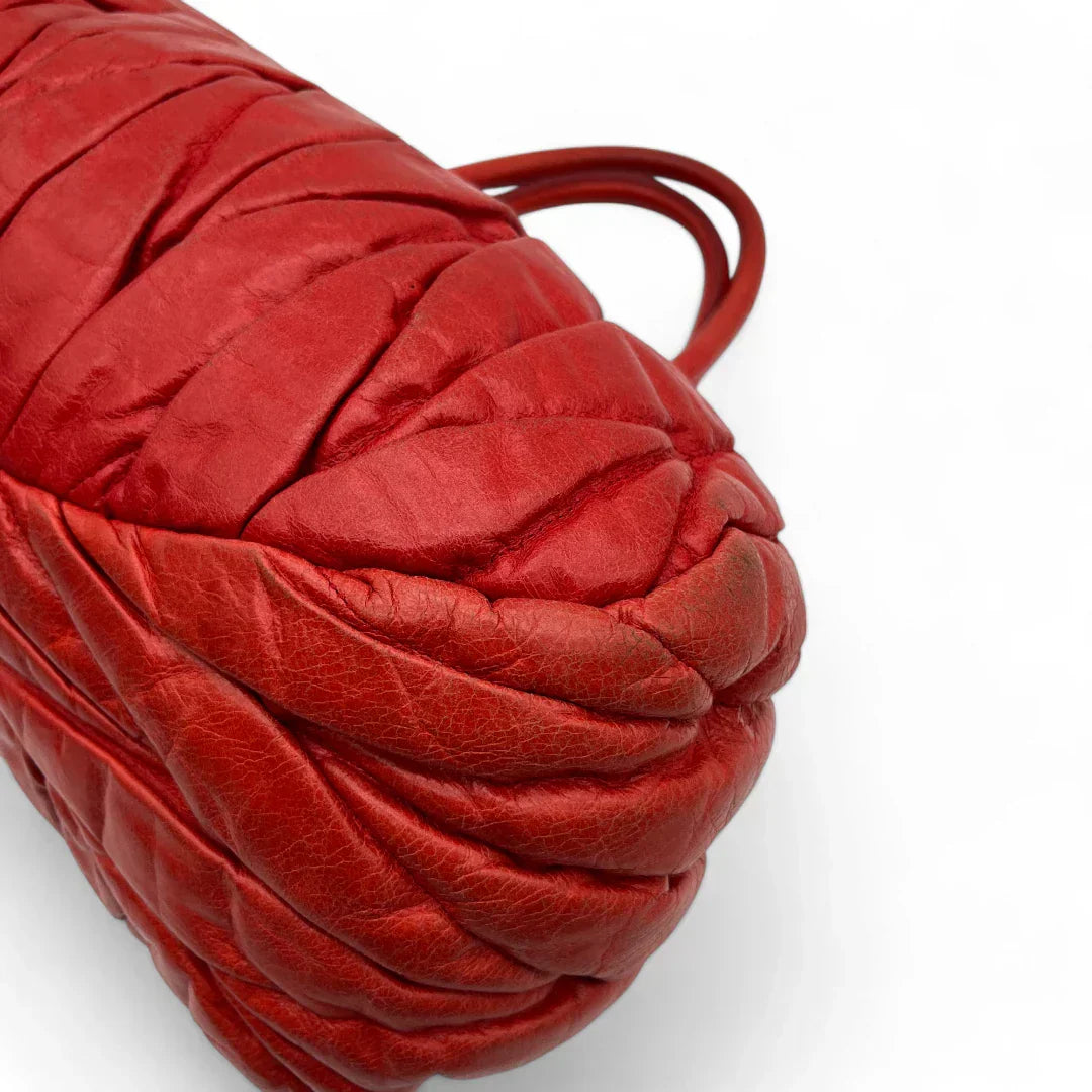 Miu Miu handbag made of leather matelasse dark red