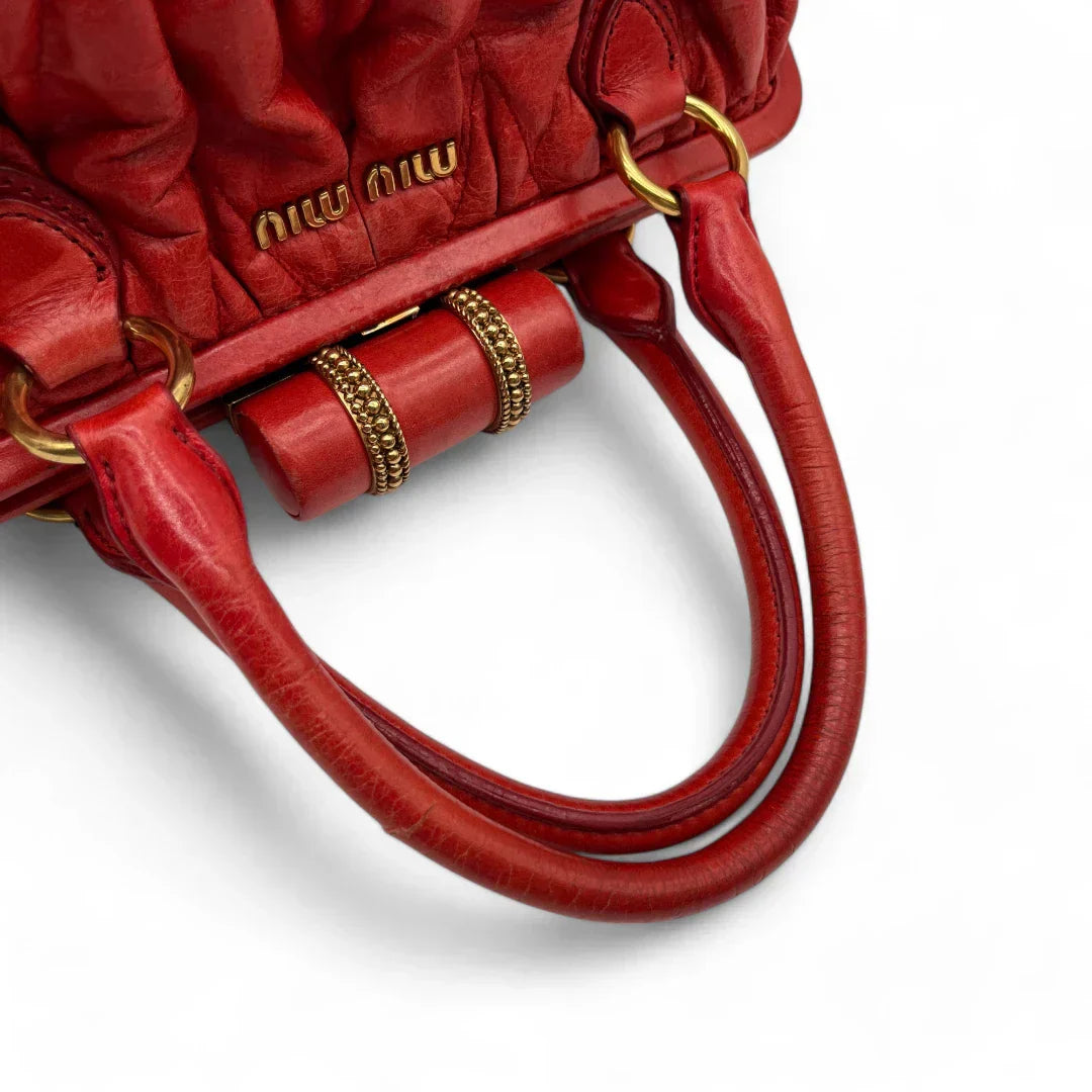 Miu Miu handbag made of leather matelasse dark red