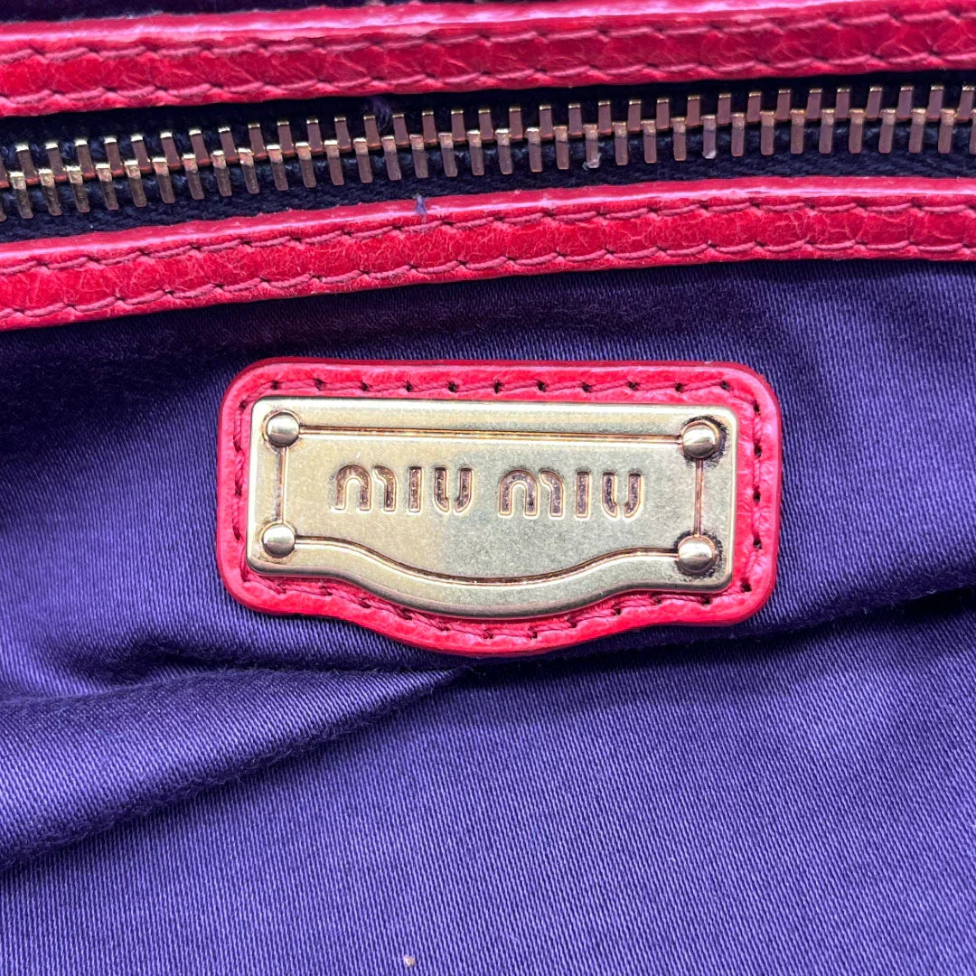 Miu Miu handbag made of leather matelasse dark red