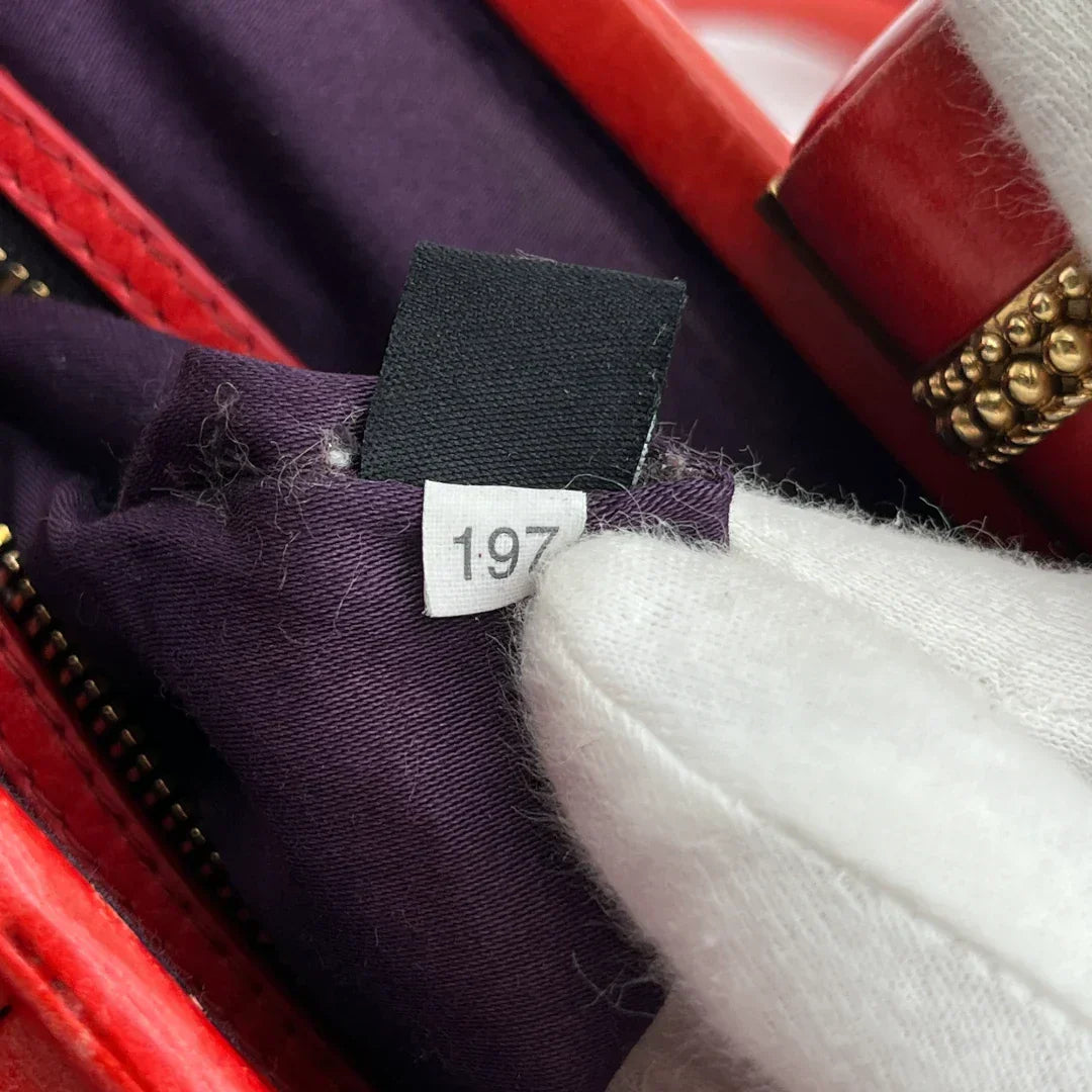 Miu Miu handbag made of leather matelasse dark red